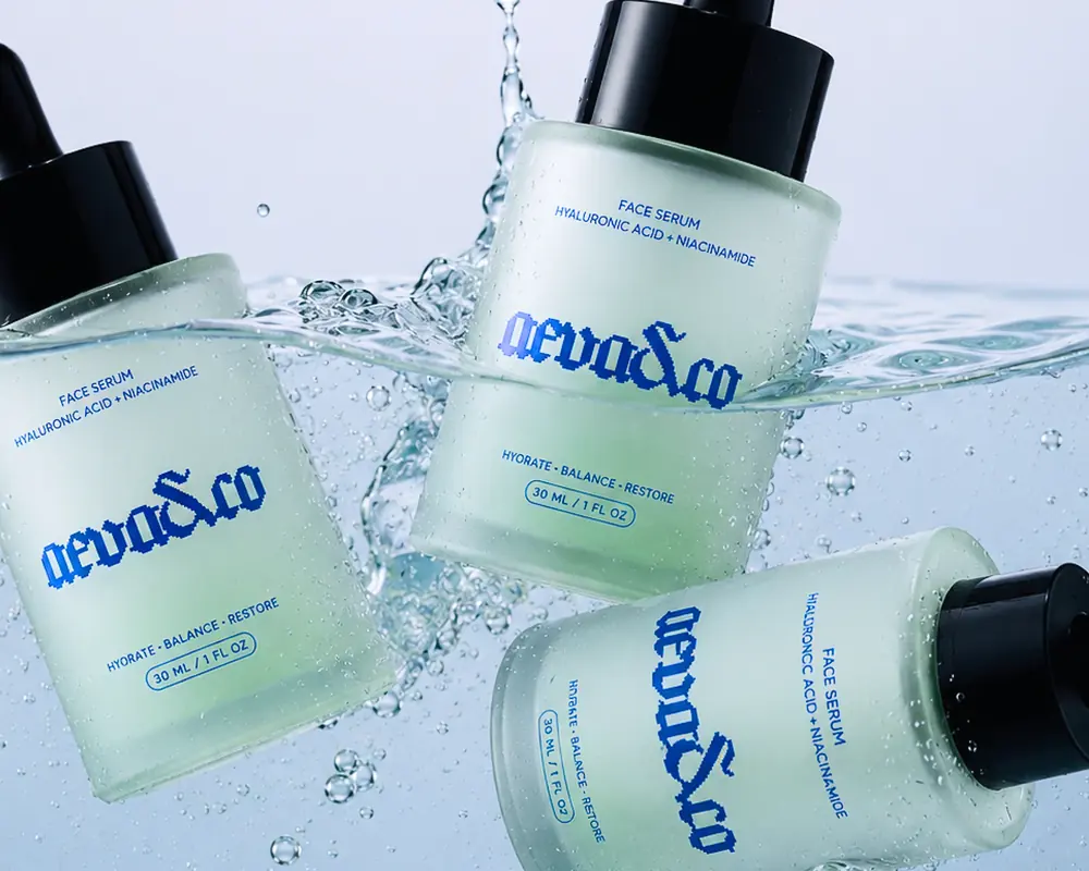 Aeva & Co serum bottles splashed with water